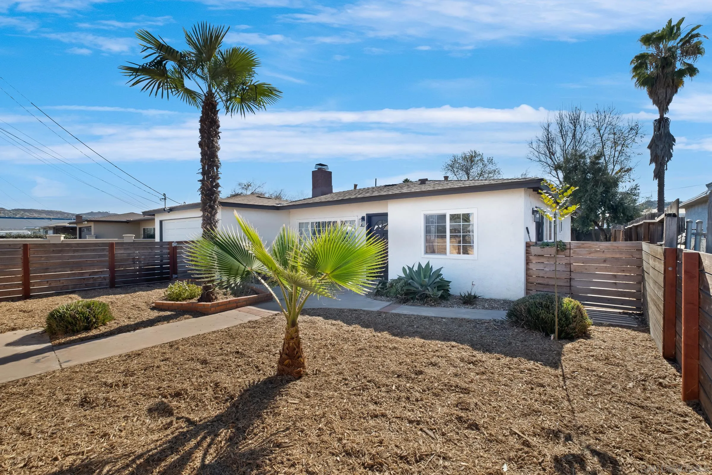 9651 Maccool Lane Santee, CA 92071 - Photo 2 of 32 a view of a backyard with a patio