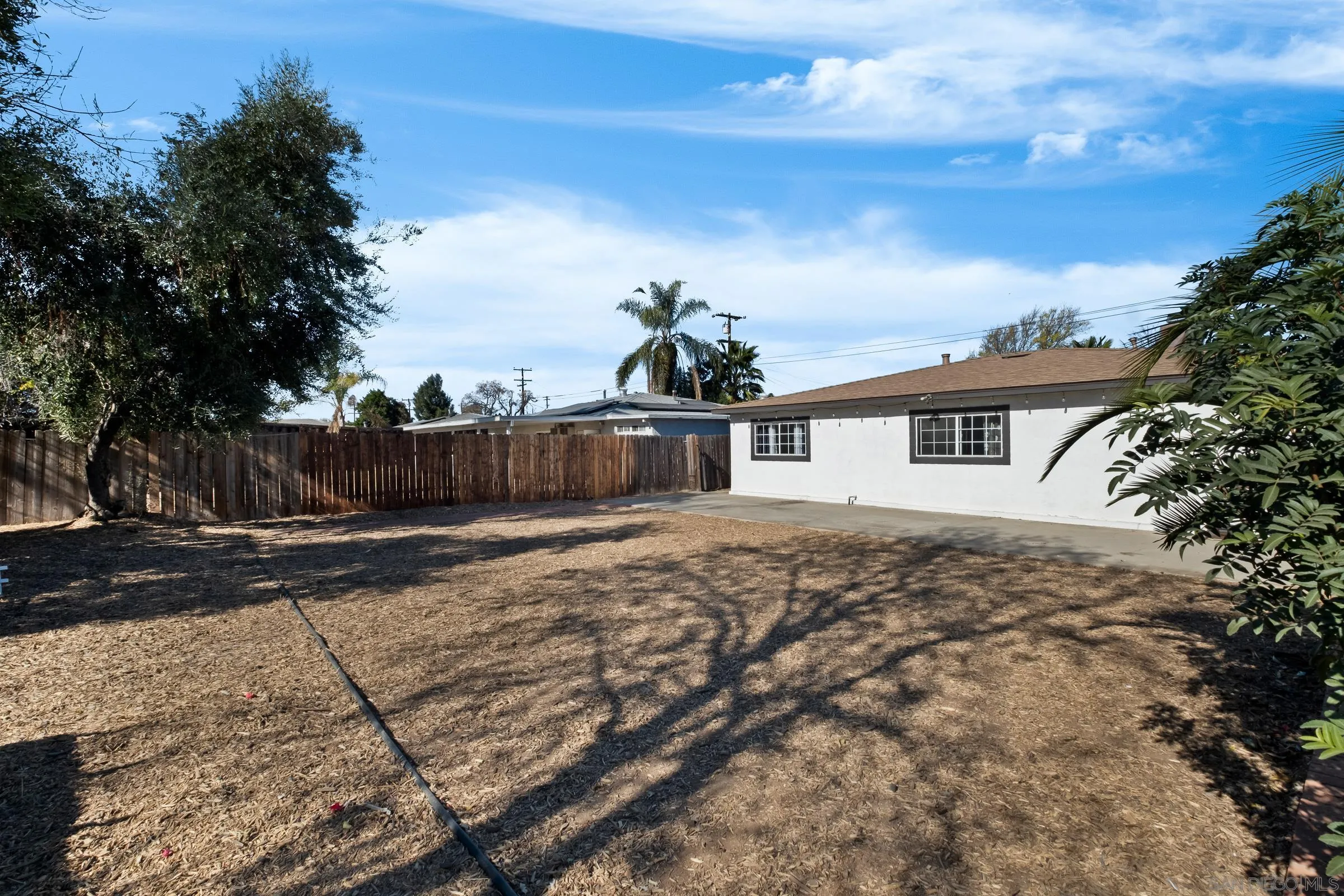 9651 Maccool Lane Santee, CA 92071 - Photo 26 of 32 a front view of a house with a yard