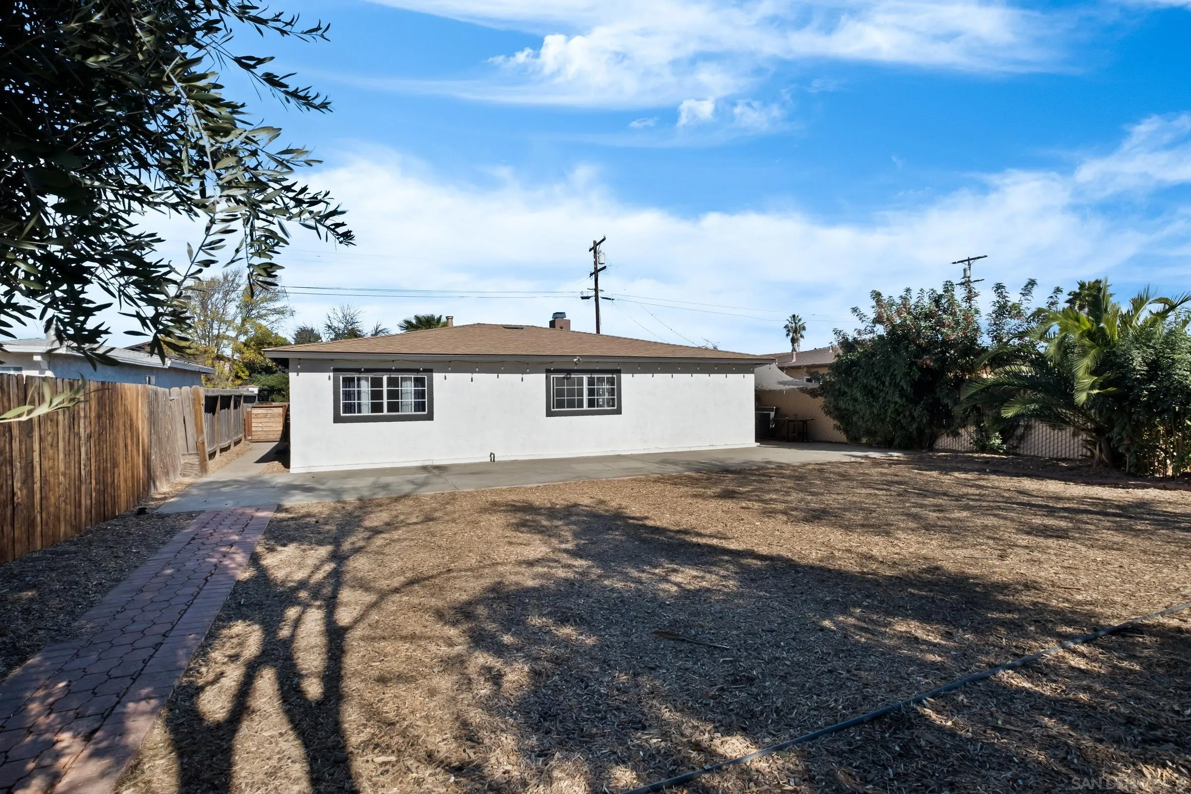 9651 Maccool Lane Santee, CA 92071 - Photo 30 of 32 a front view of a house with a yard