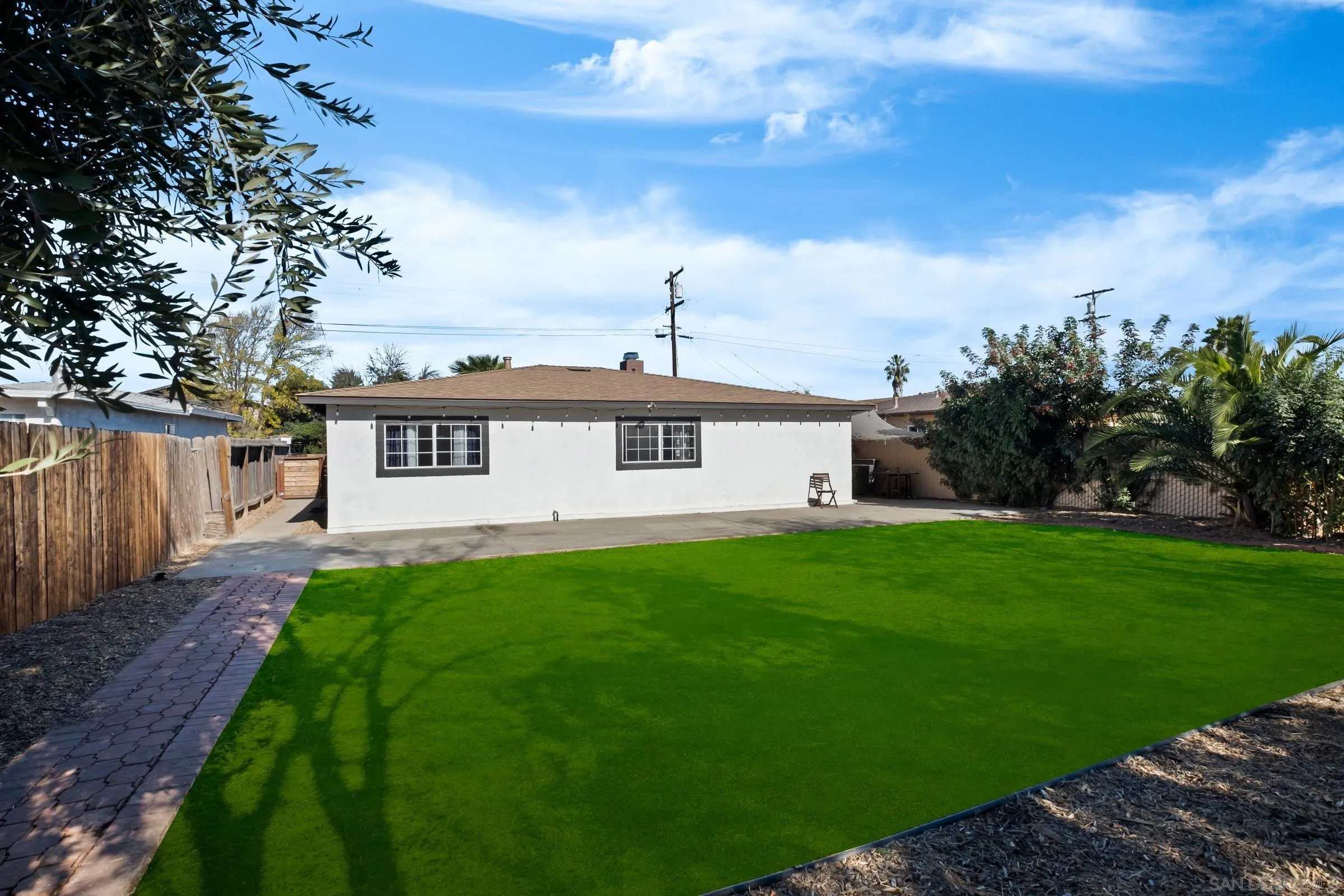 9651 Maccool Lane Santee, CA 92071 - Photo 31 of 32 a front view of a house with garden