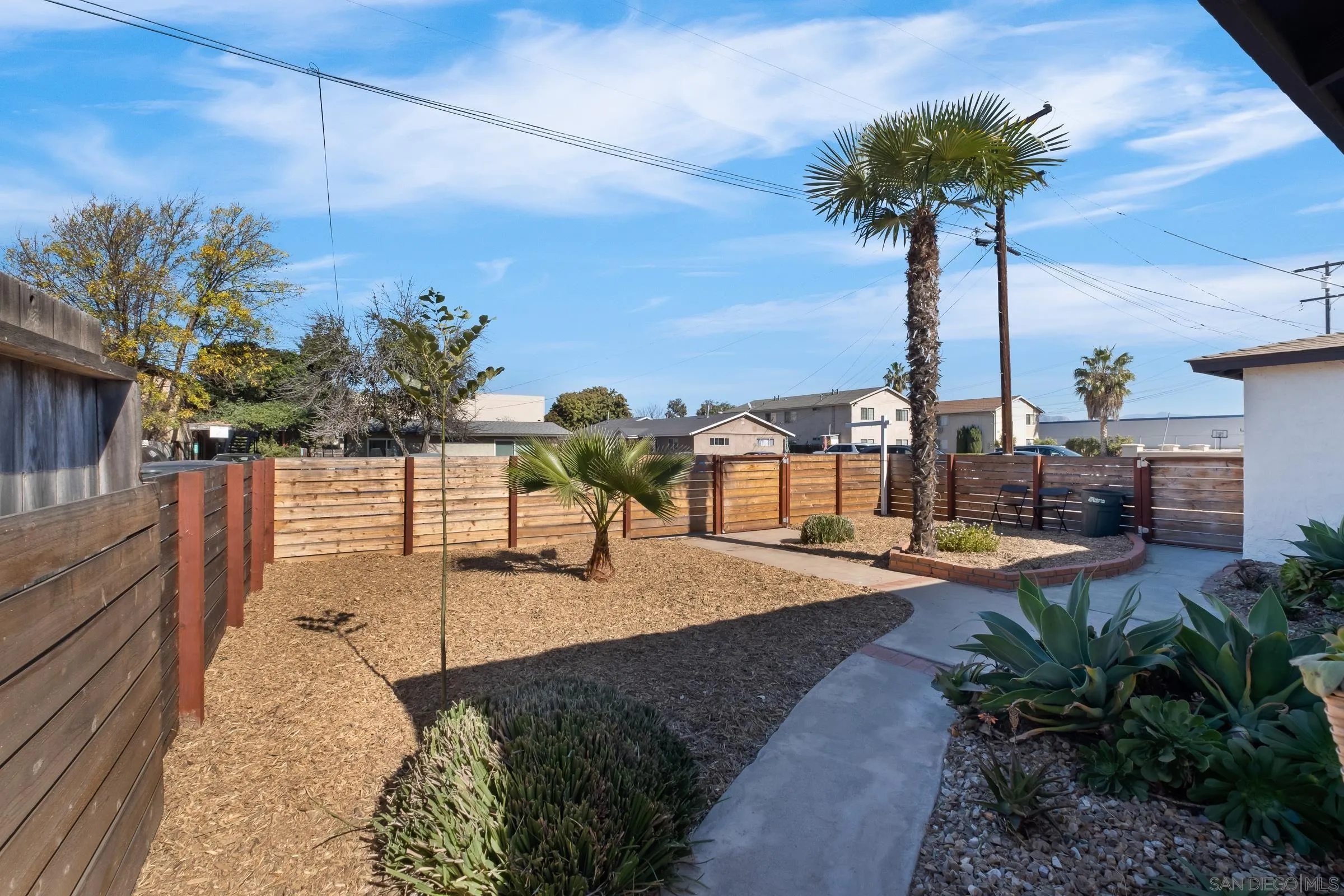 9651 Maccool Lane Santee, CA 92071 - Photo 8 of 32 a view of a backyard