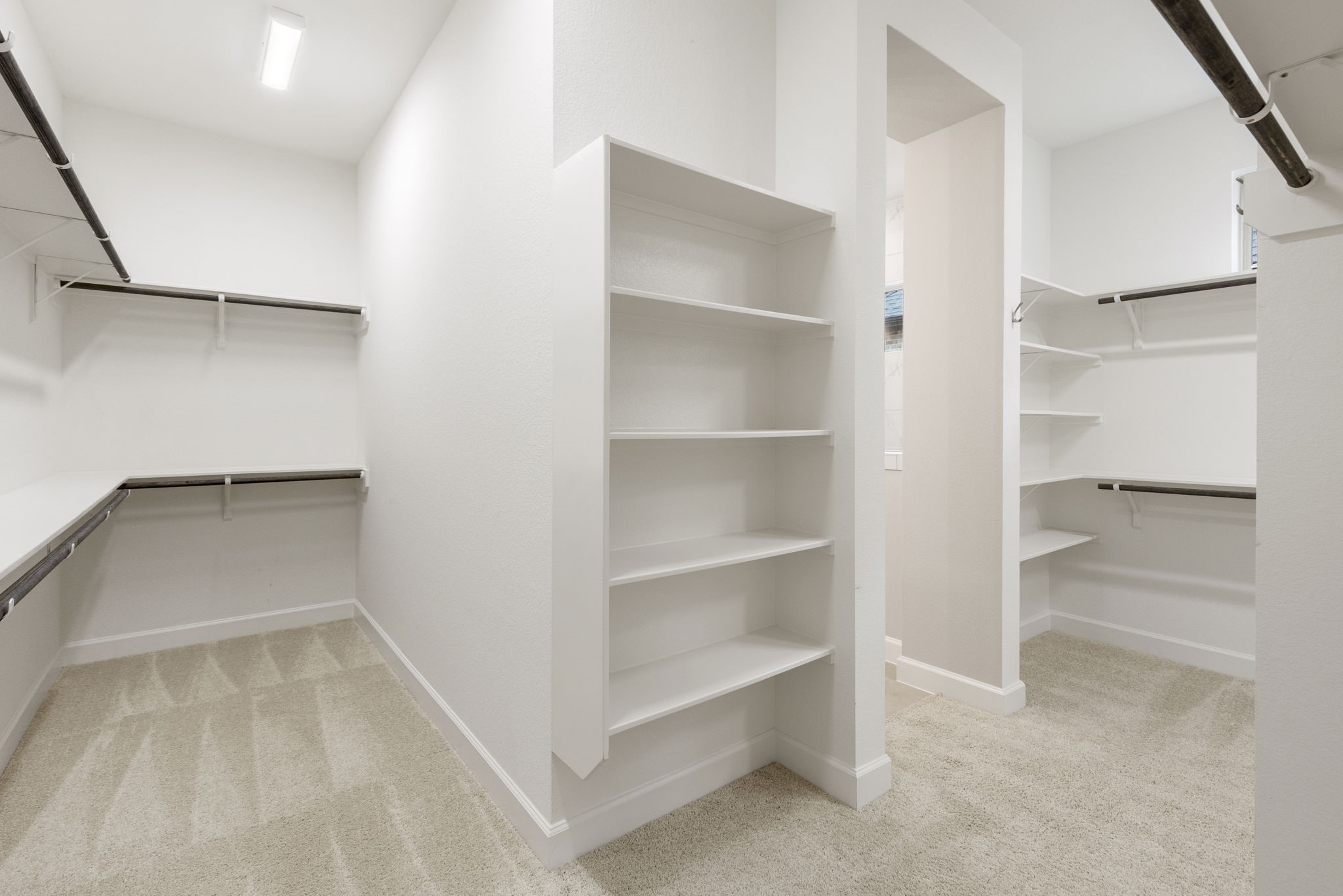 15834 Moran Meadow Street Conroe, TX 77302 - Photo 20 of 41 a view of an empty walk in closet