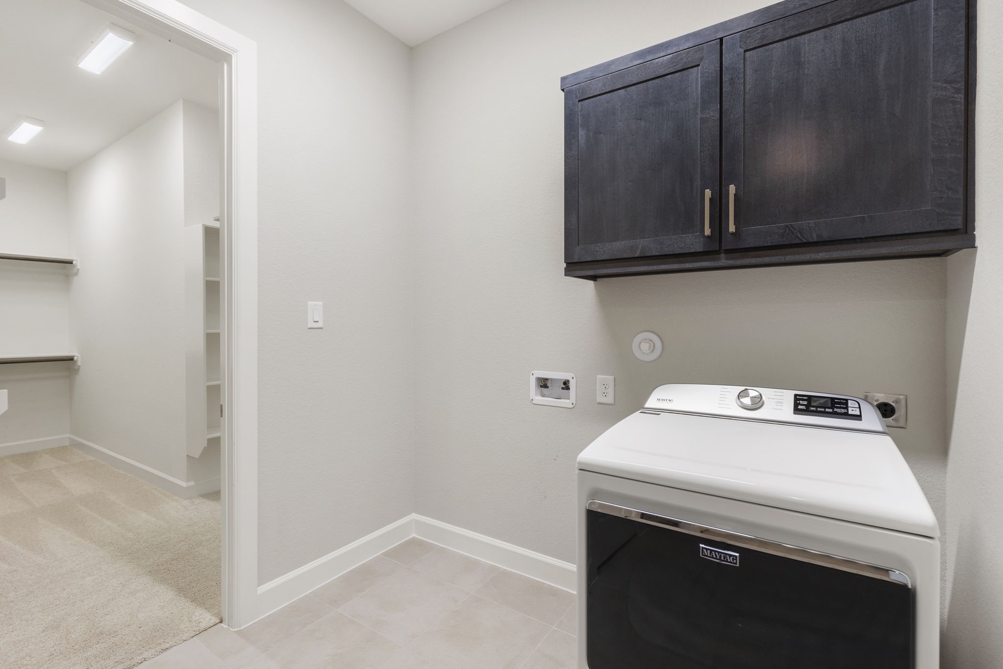 15834 Moran Meadow Street Conroe, TX 77302 - Photo 21 of 41 a utility room with dryer and washer