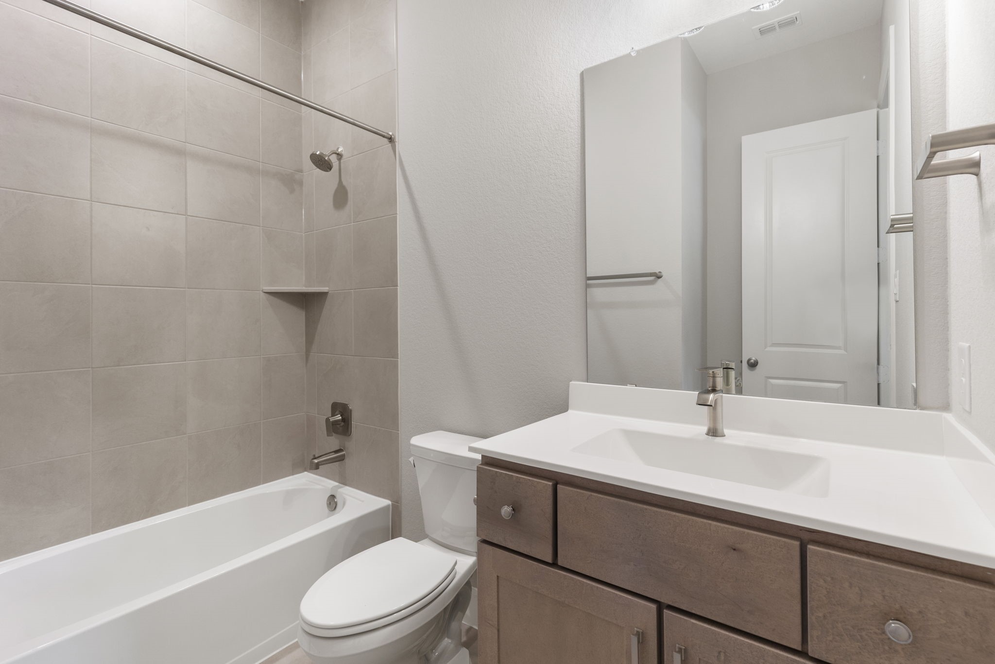 15834 Moran Meadow Street Conroe, TX 77302 - Photo 26 of 41 a bathroom with a sink toilet and shower