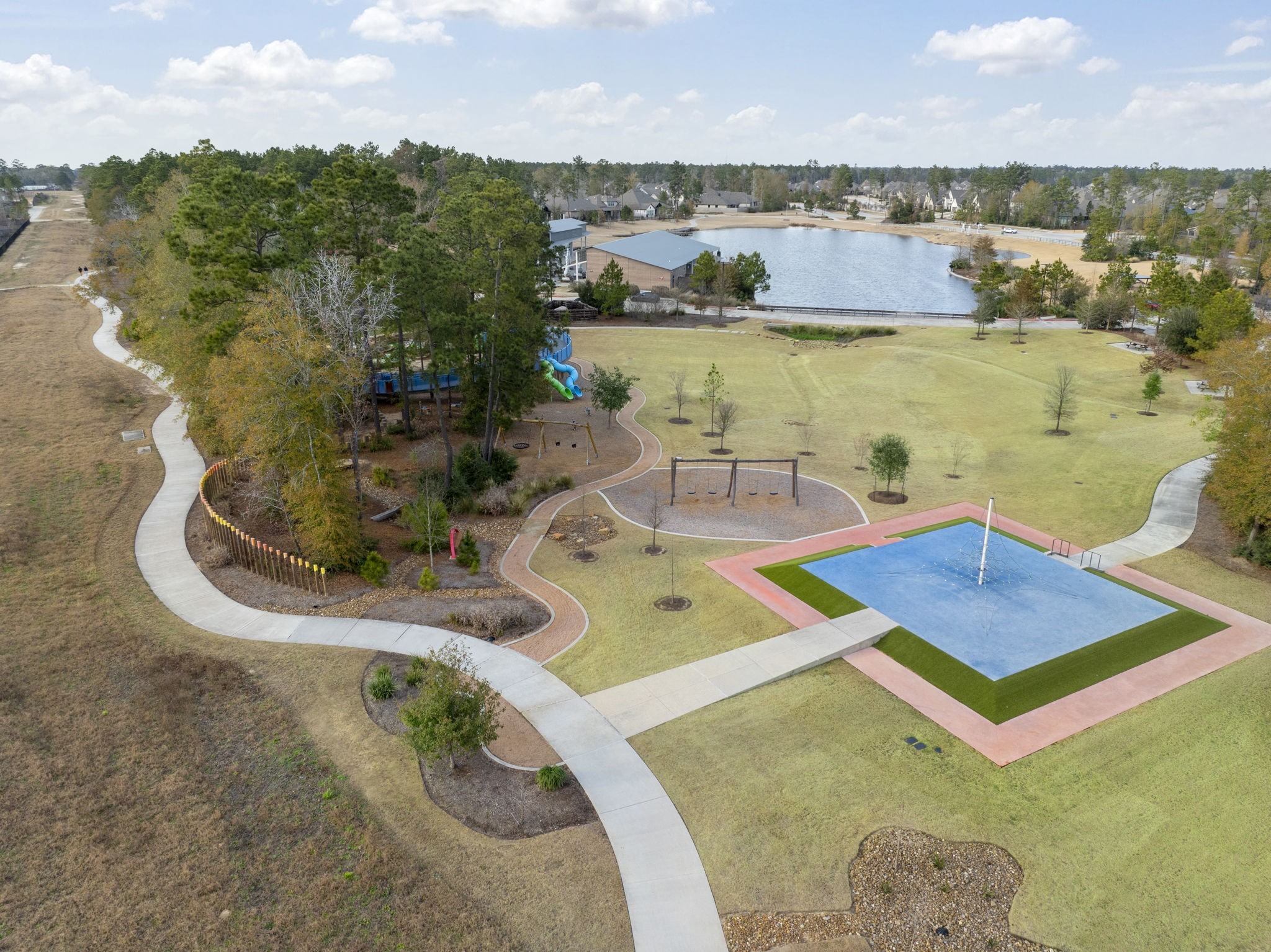 15834 Moran Meadow Street Conroe, TX 77302 - Photo 39 of 41 a view of a swimming pool with an ocean view