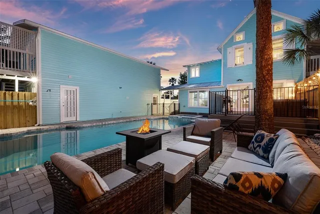 a outdoor living space with furniture and a potted plant
