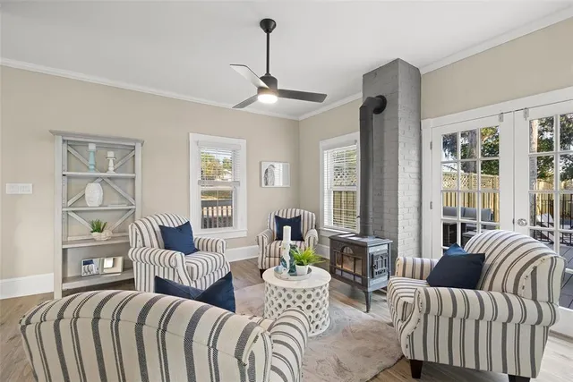 a bedroom with furniture and windows