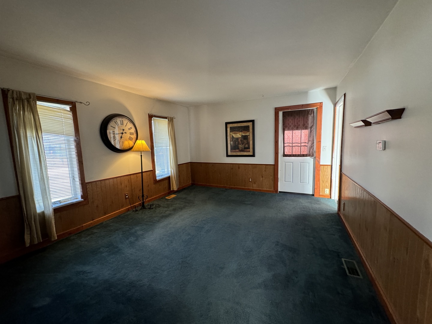 215 Ash Road Kingston, IL 60145 - Photo 4 of 9 a view of an empty room with a window