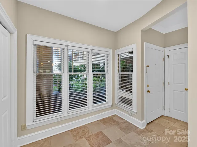 a view of a room that has a large window