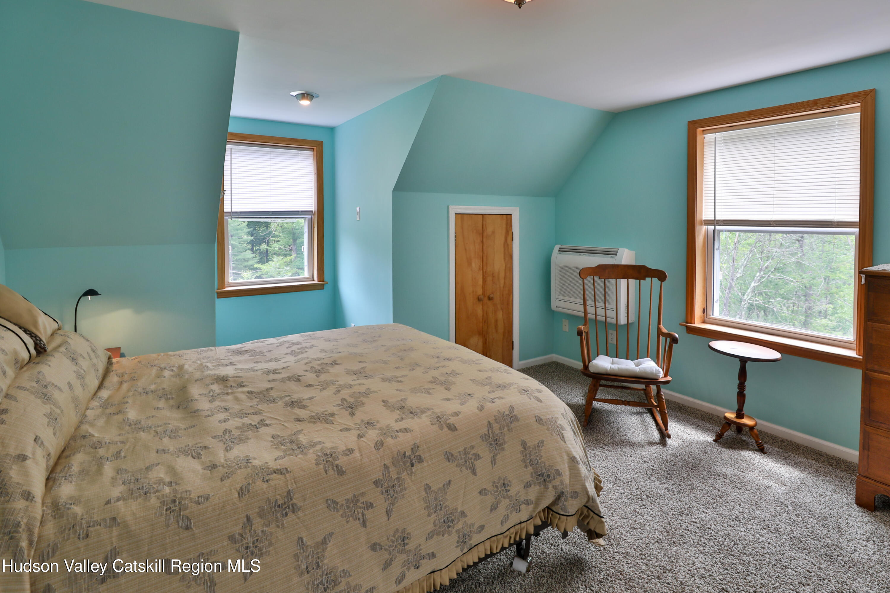 68 Garfield Road Phoenicia, NY 12464 - Photo 15 of 43 a bedroom with a bed chair and a window