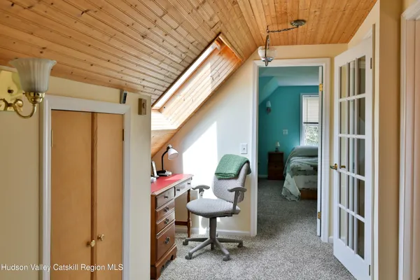 a view of a porch with seating space