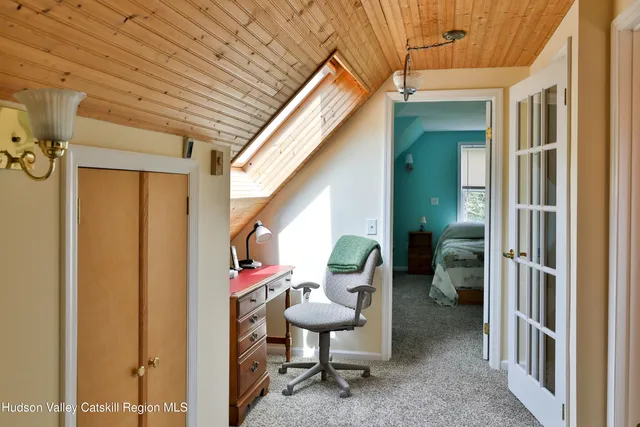 a view of a porch with seating space