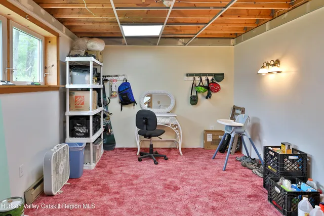 a view of a workspace with furniture