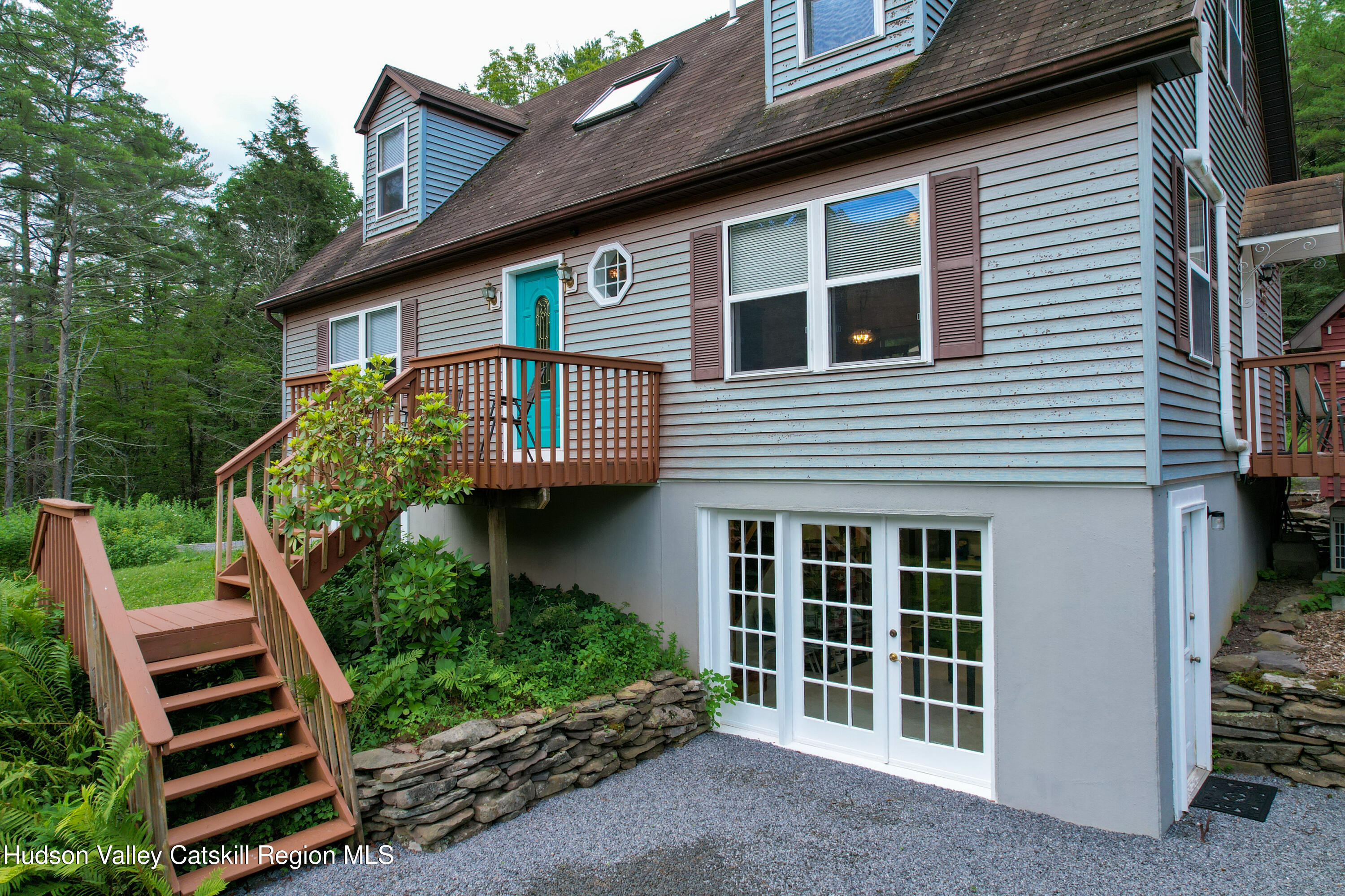 68 Garfield Road Phoenicia, NY 12464 - Photo 23 of 43 a front view of a house with a yard