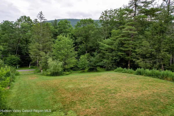 a view of a big yard with green space