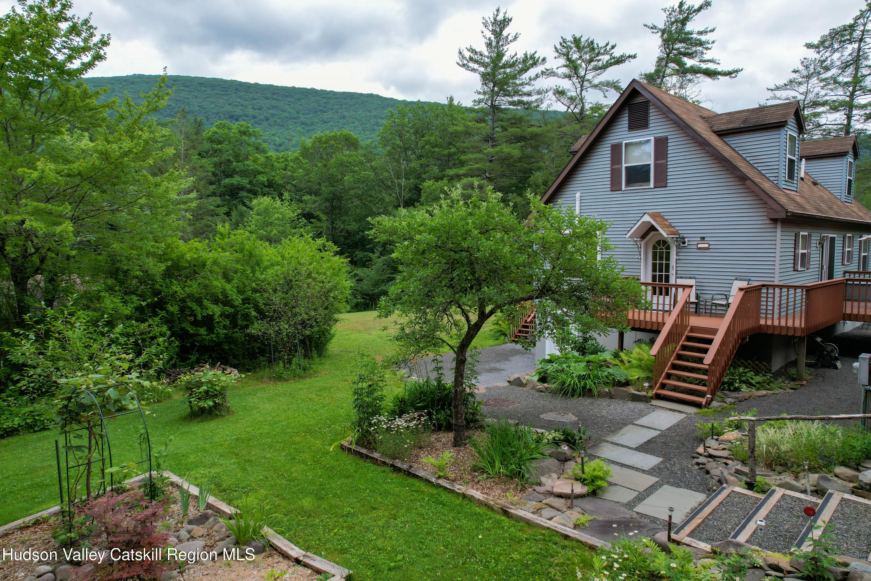 68 Garfield Road Phoenicia, NY 12464 - Photo 27 of 43 a front view of a house with a yard
