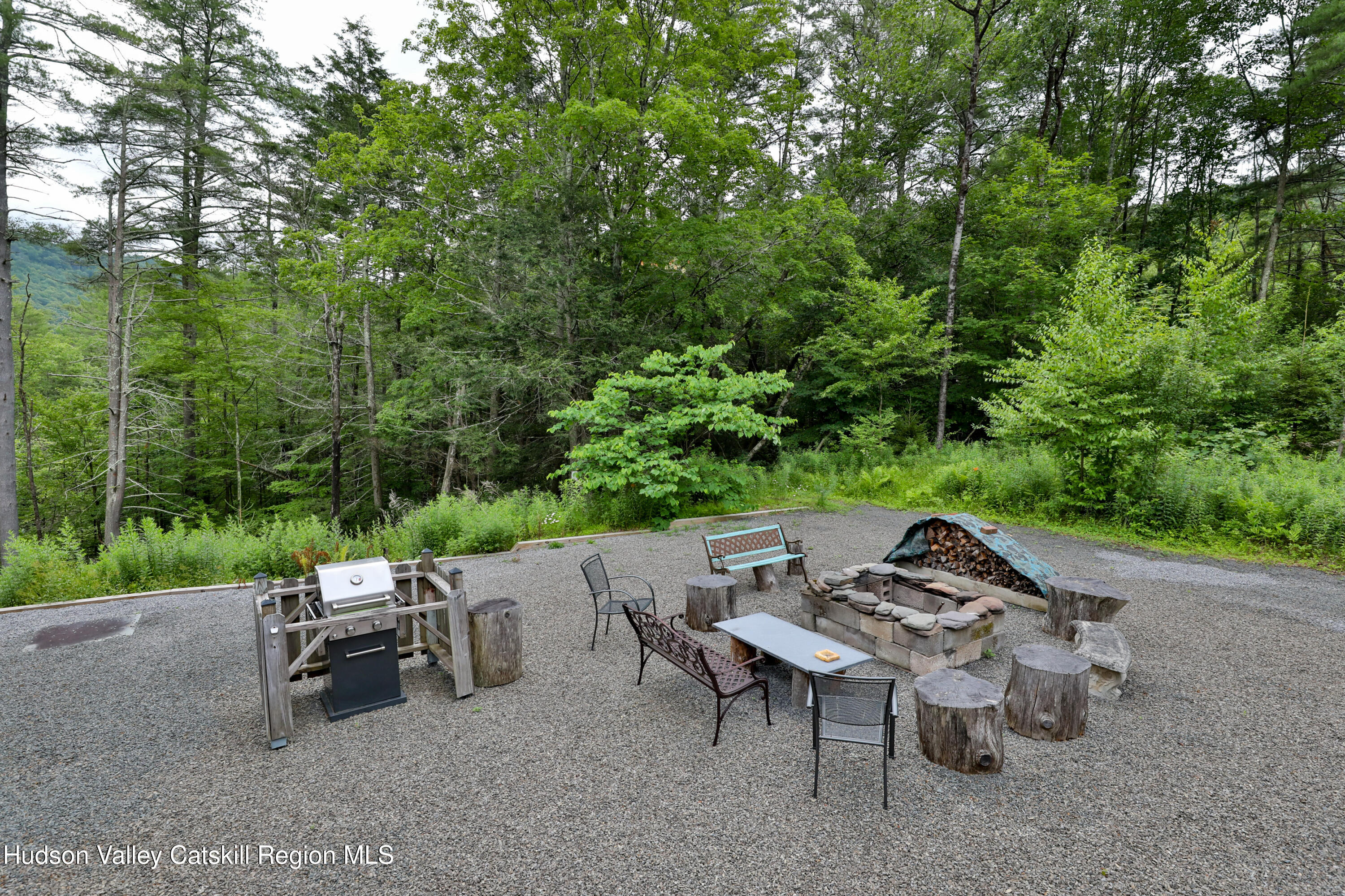 68 Garfield Road Phoenicia, NY 12464 - Photo 30 of 43 a view of patio with table and chairs and couches