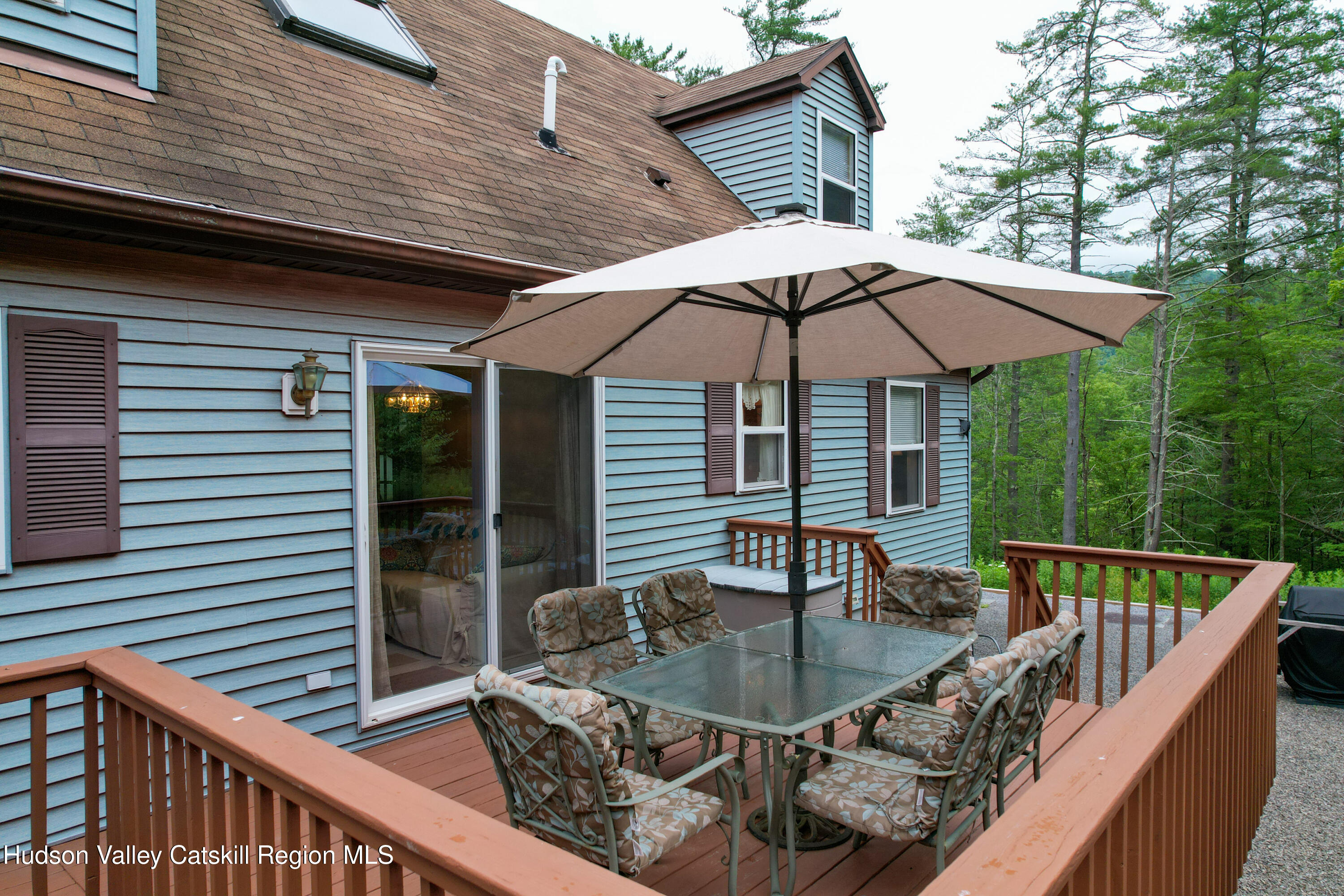 68 Garfield Road Phoenicia, NY 12464 - Photo 3 of 43 a balcony with table and chairs