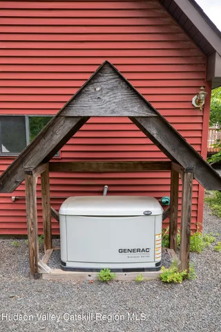 a view of a lush green forest with lots of trees