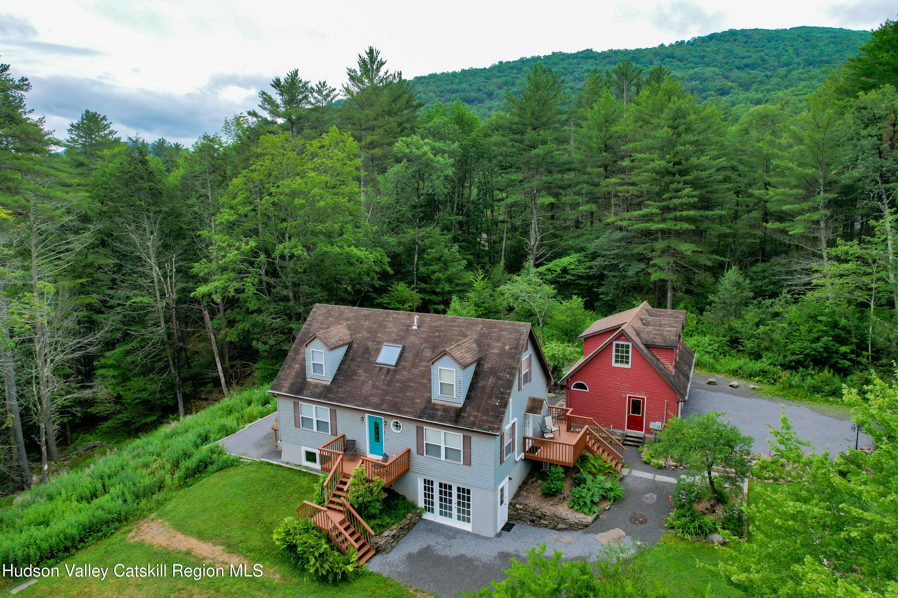 68 Garfield Road Phoenicia, NY 12464 - Photo 42 of 43 an aerial view of a house with pool outdoor seating and trees