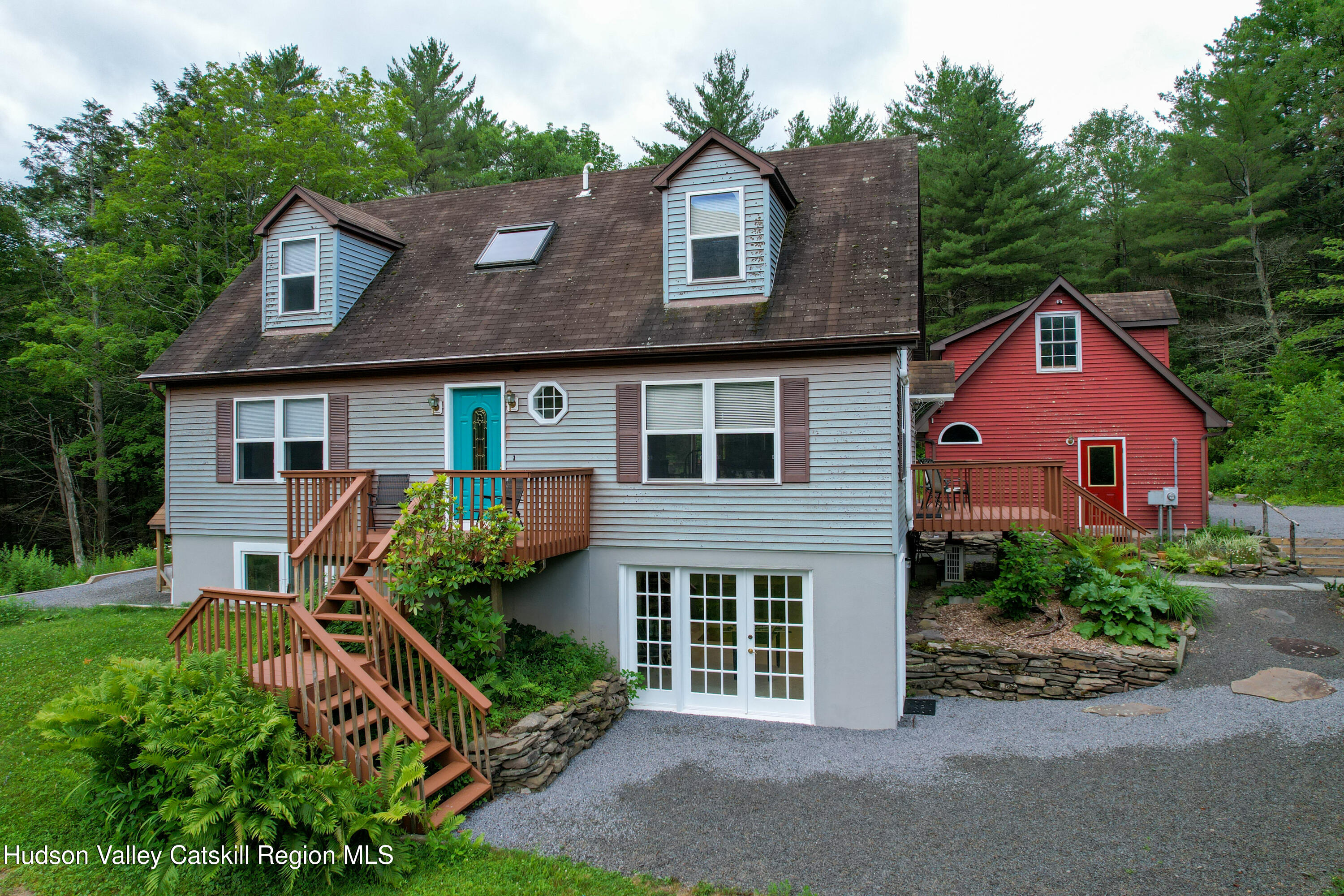 68 Garfield Road Phoenicia, NY 12464 - Photo 5 of 43 front view of a house with a yard