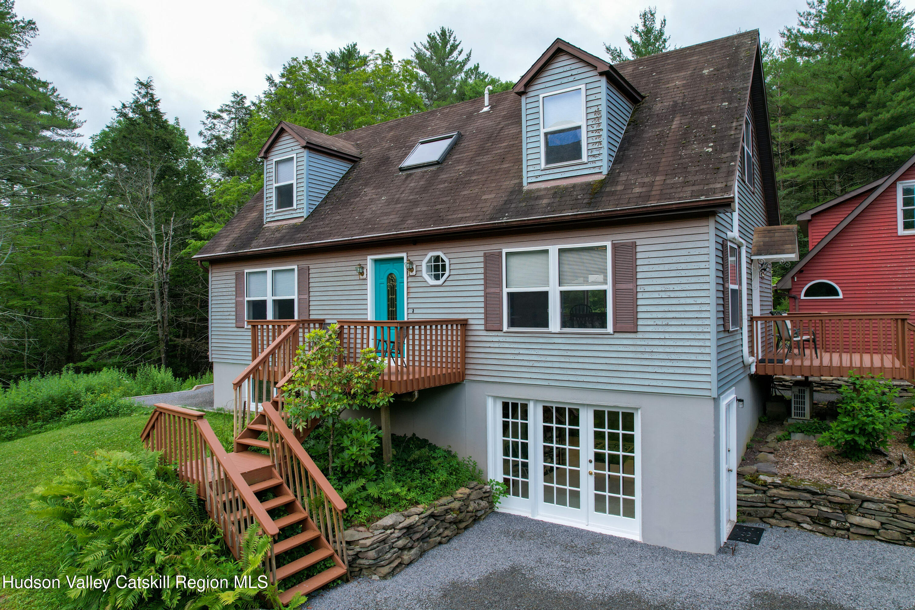 68 Garfield Road Phoenicia, NY 12464 - Photo 8 of 43 a front view of a house with garden