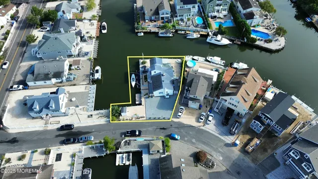 a view of livingroom and dining room with furniture and floor to ceiling