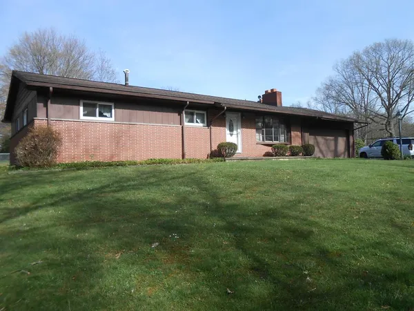 a view of a backyard with a garden