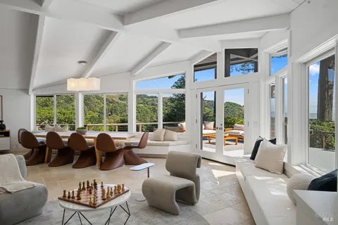 a living room with furniture and window