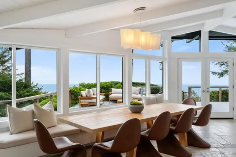 a white stove top oven sitting inside of a kitchen