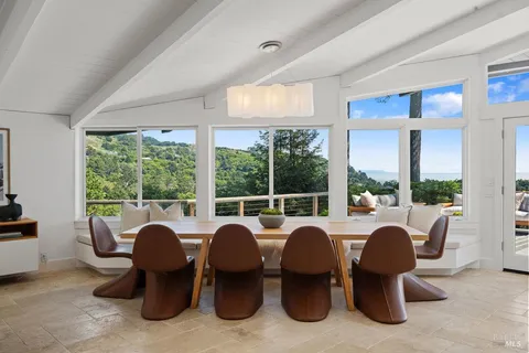 a bed room with bed and a potted plant