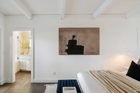 an aerial view of a house with outdoor space patio and trees