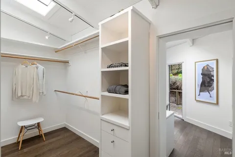 an aerial view of a house with a big yard