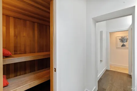 a living room with furniture large window and flat screen tv