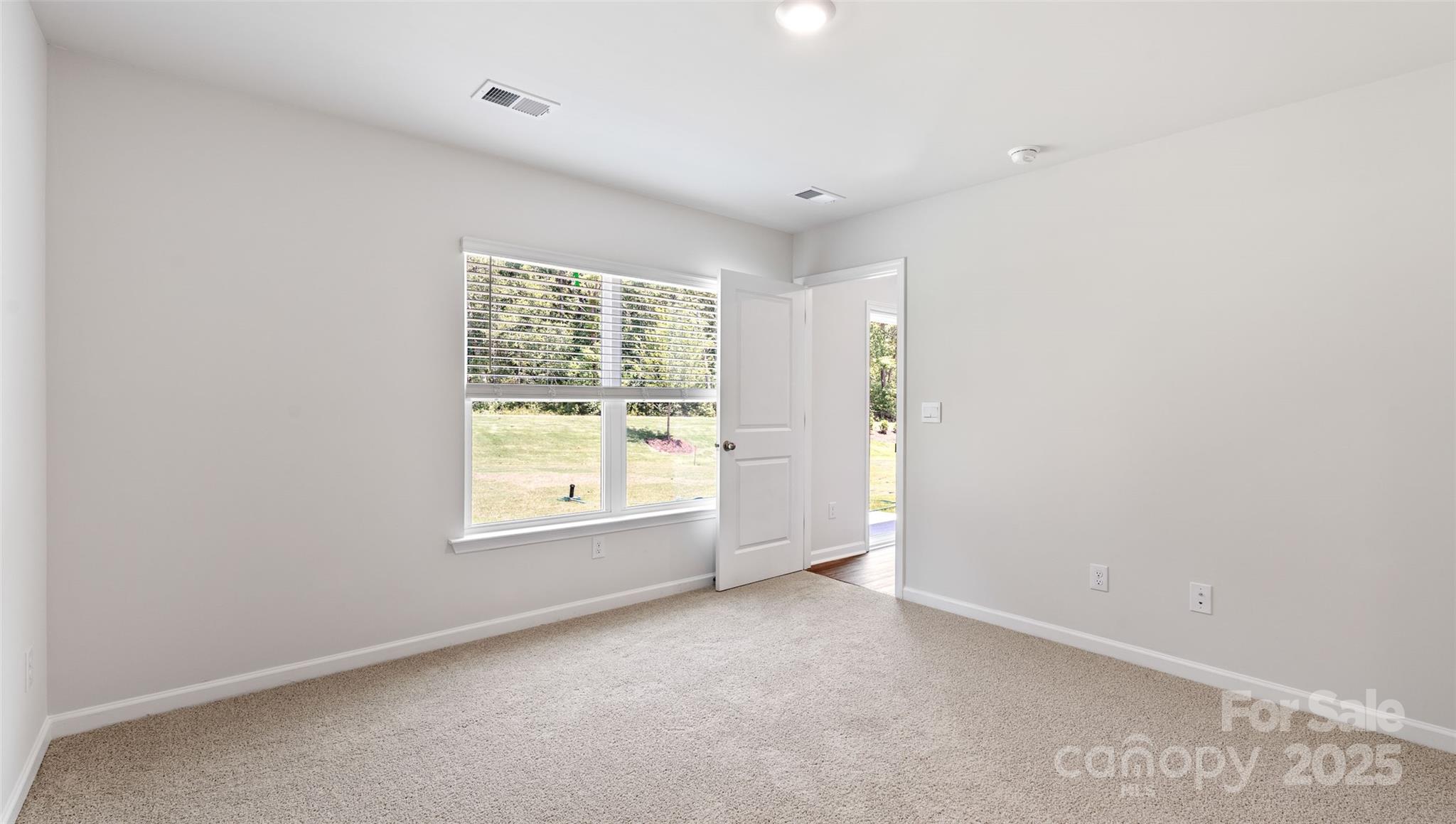 10 Callie River Clyde, NC 28721 - Photo 12 of 23 an empty room with a window