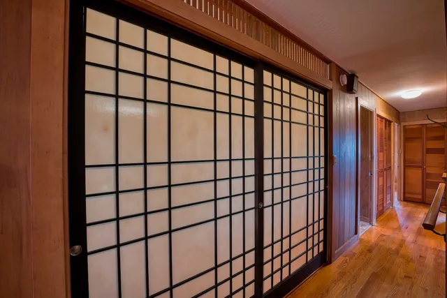 a view of staircase with a large window