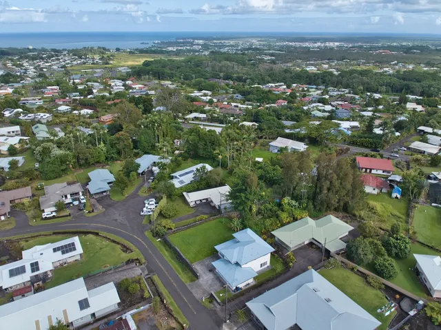 an aerial view of a city with lots of residential buildings