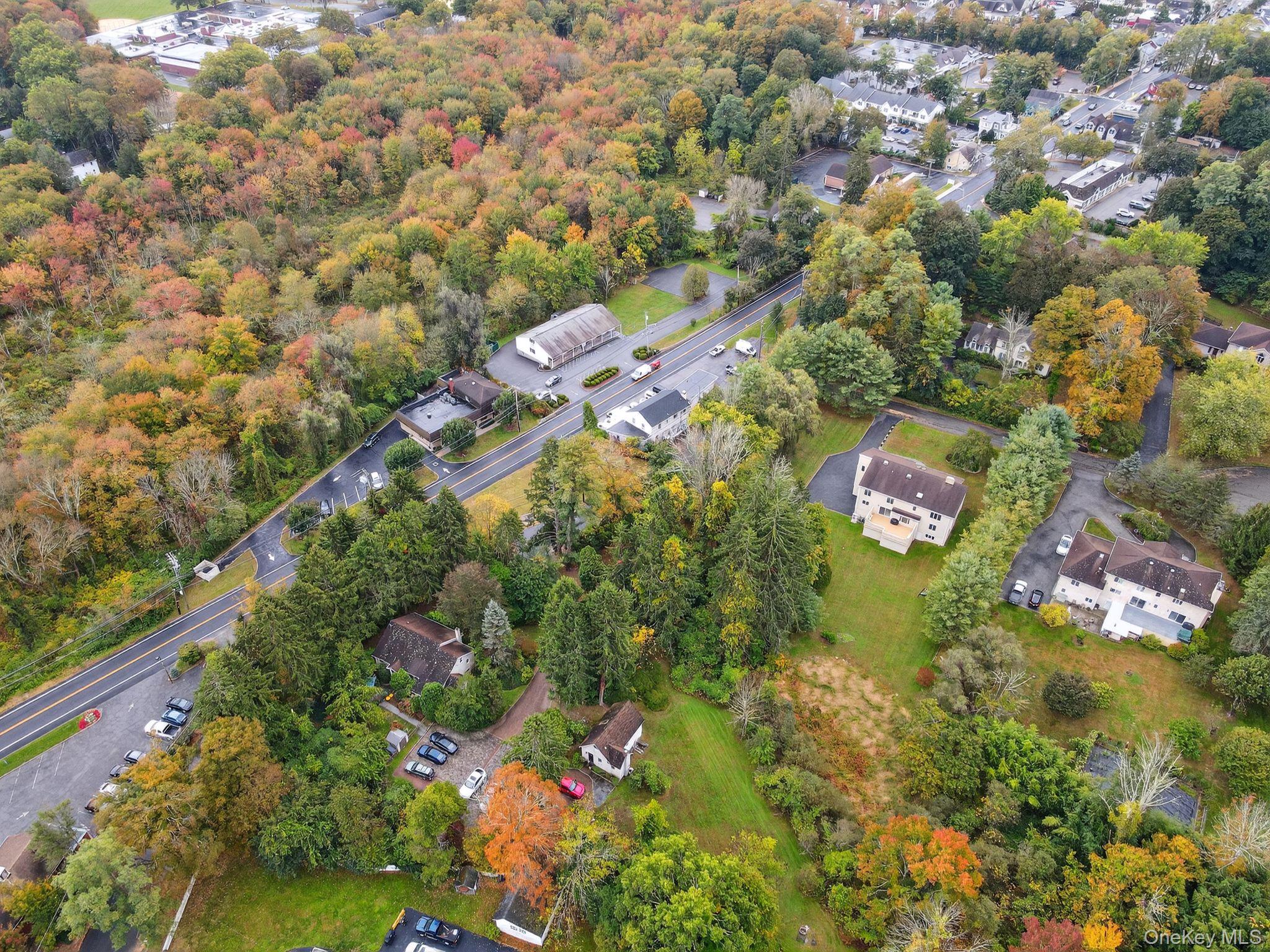 20 Old Mt Kisco Road Armonk, NY 10504 - Photo 15 of 50 an aerial view of residential house with outdoor space and trees all around