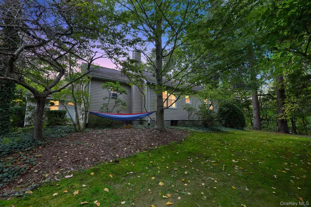 a backyard of a house with lots of green space