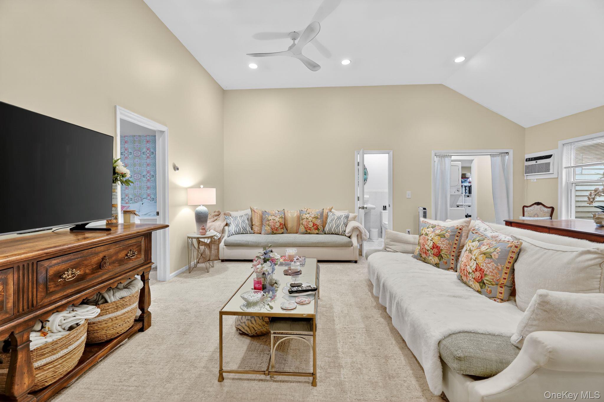 20 Old Mt Kisco Road Armonk, NY 10504 - Photo 25 of 50 a living room with furniture and a flat screen tv