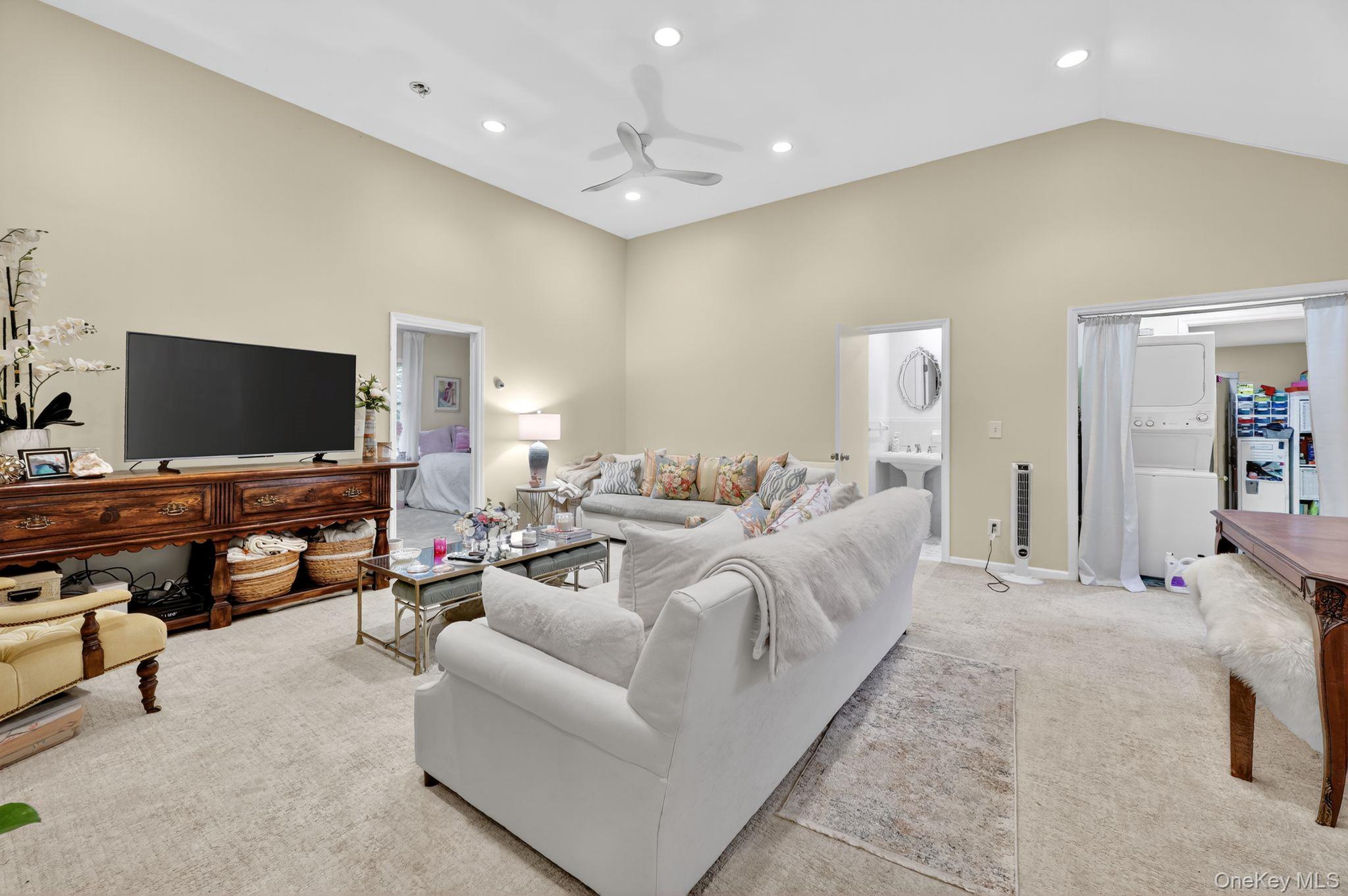 20 Old Mt Kisco Road Armonk, NY 10504 - Photo 26 of 50 a living room with furniture and a flat screen tv