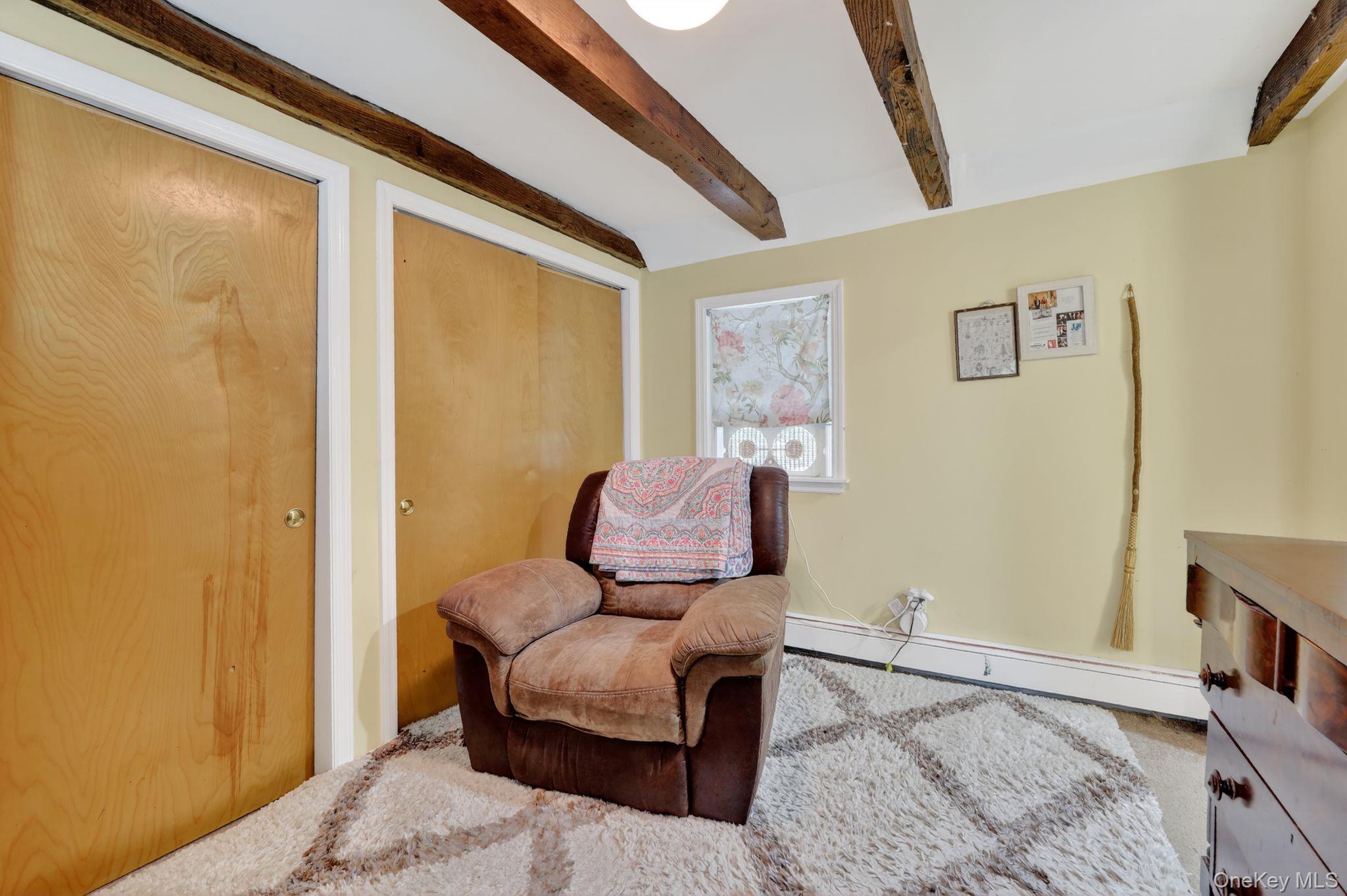 20 Old Mt Kisco Road Armonk, NY 10504 - Photo 28 of 50 a living room with furniture and a flat screen tv
