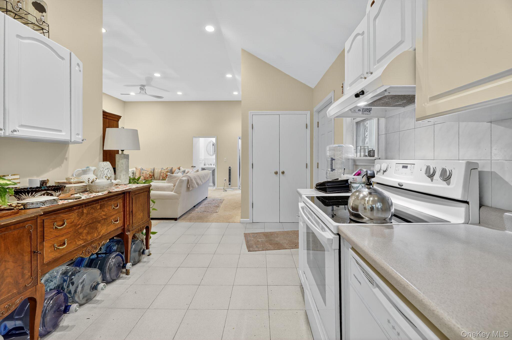 20 Old Mt Kisco Road Armonk, NY 10504 - Photo 31 of 50 a kitchen with stainless steel appliances a sink stove and cabinets