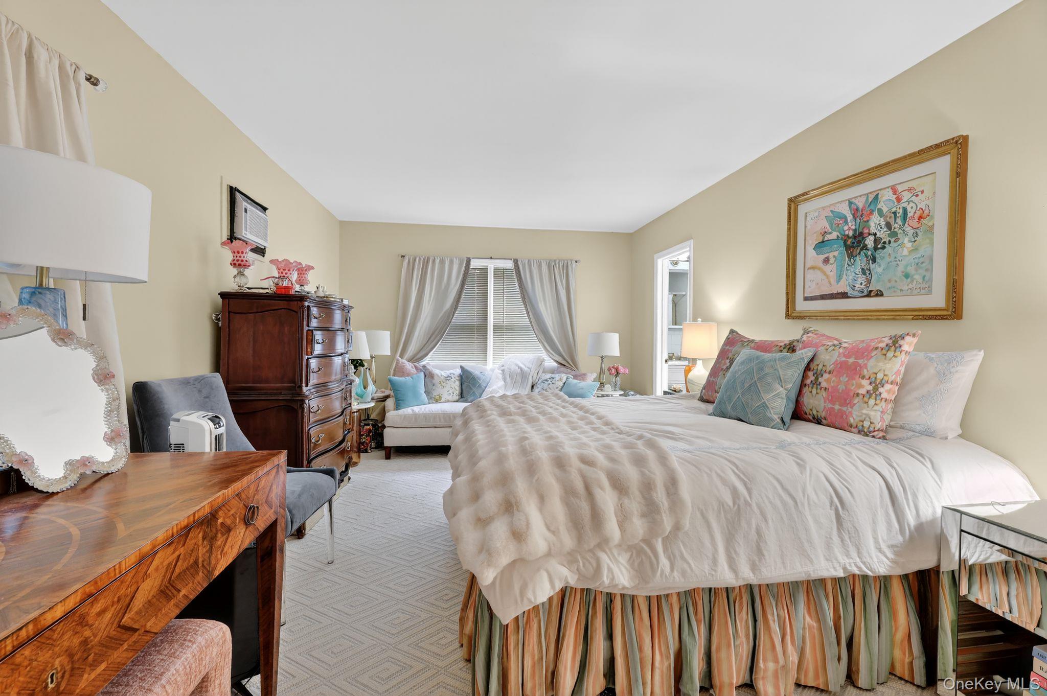 20 Old Mt Kisco Road Armonk, NY 10504 - Photo 36 of 50 a bedroom with a bed and wooden floor