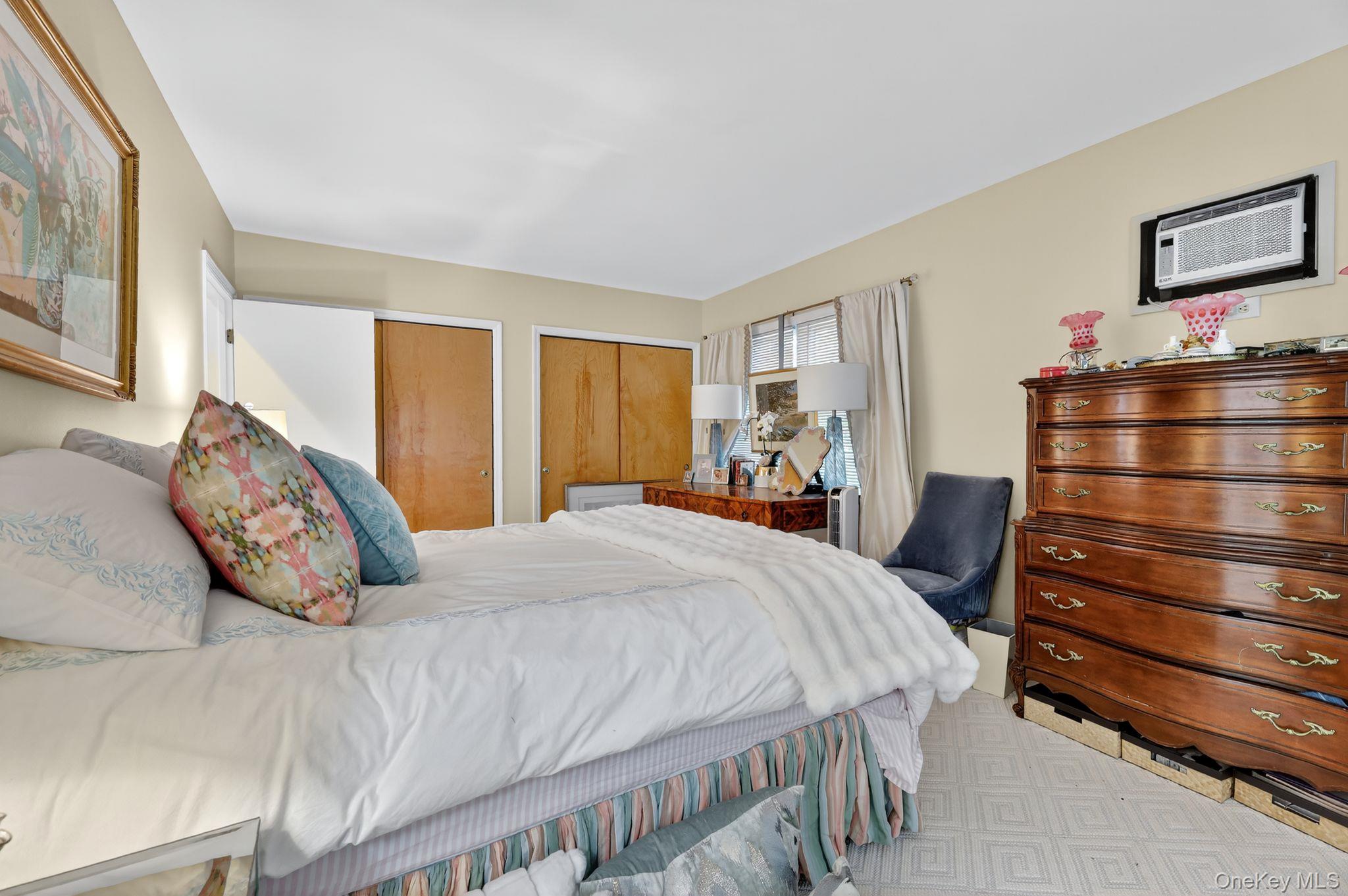 20 Old Mt Kisco Road Armonk, NY 10504 - Photo 40 of 50 a bedroom with a bed and wooden floor