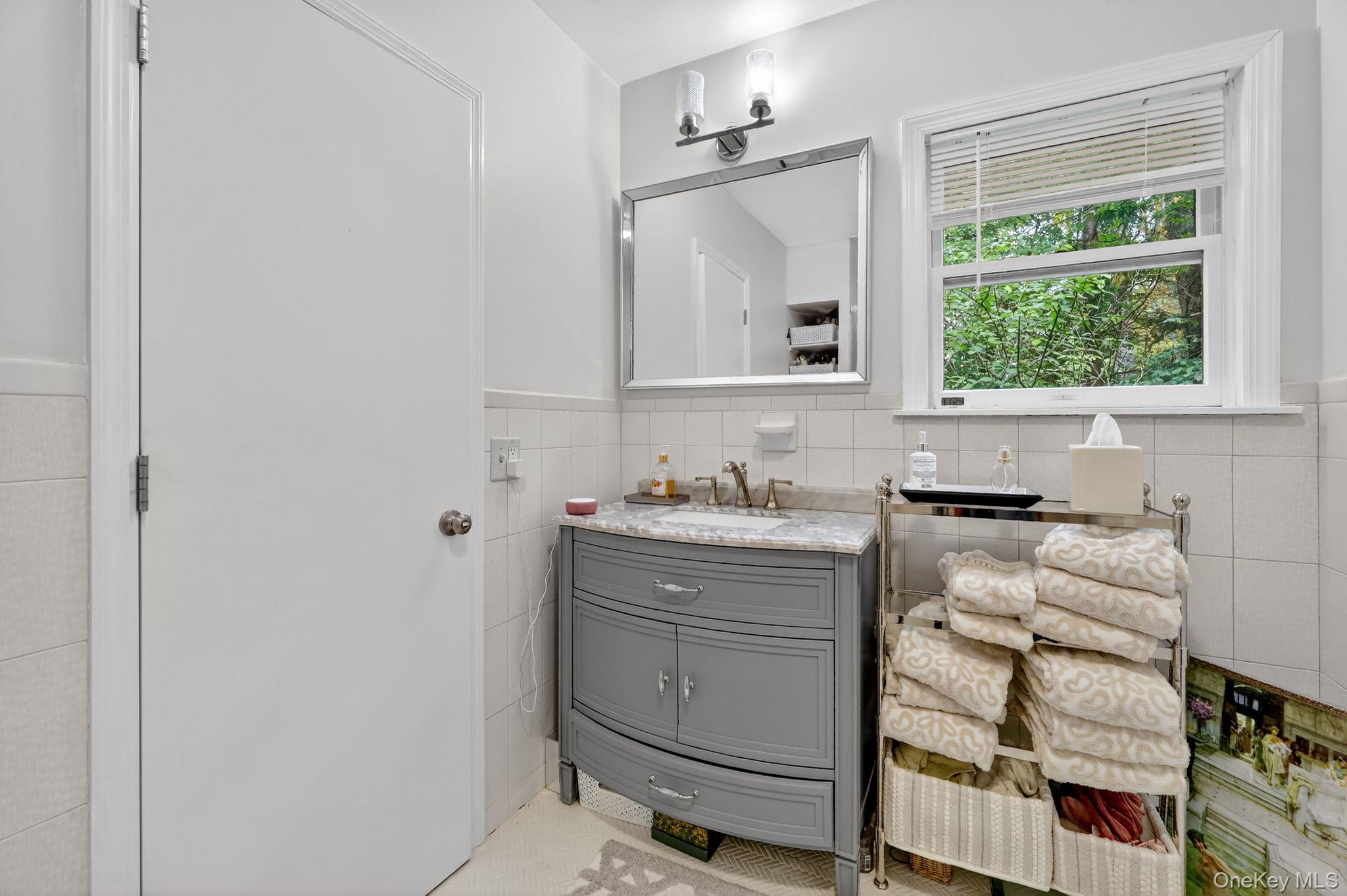 20 Old Mt Kisco Road Armonk, NY 10504 - Photo 43 of 50 a bathroom with a sink and a mirror