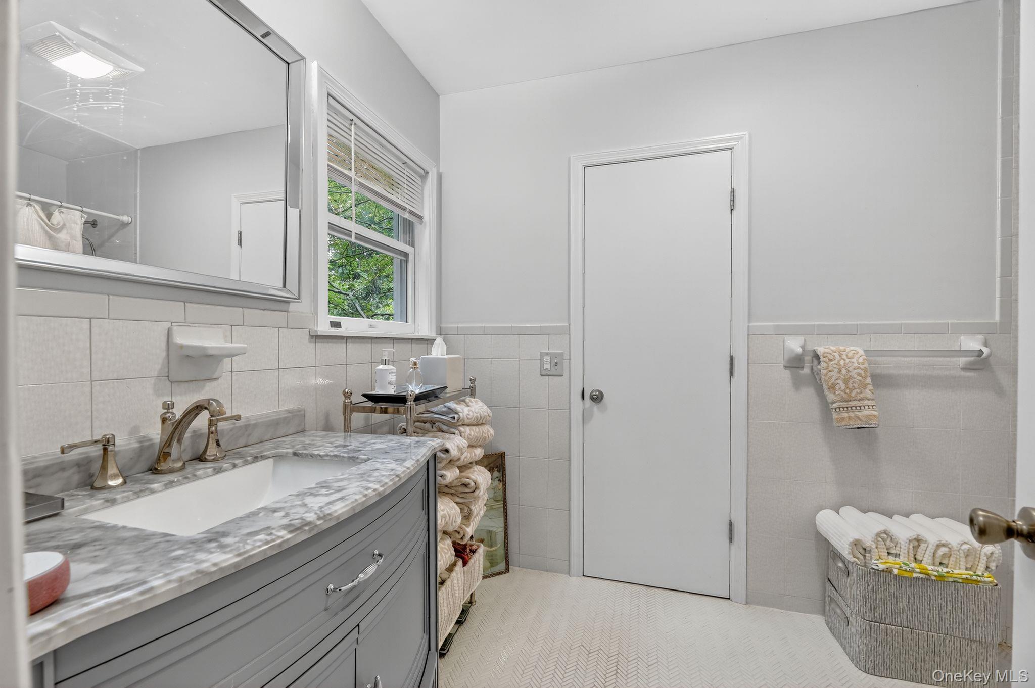 20 Old Mt Kisco Road Armonk, NY 10504 - Photo 46 of 50 a kitchen with a sink stove and cabinets