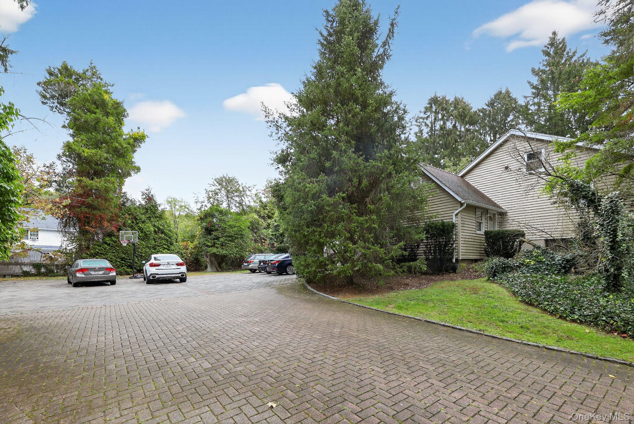 20 Old Mt Kisco Road Armonk, NY 10504 - Photo 7 of 50 a view of a street with cars