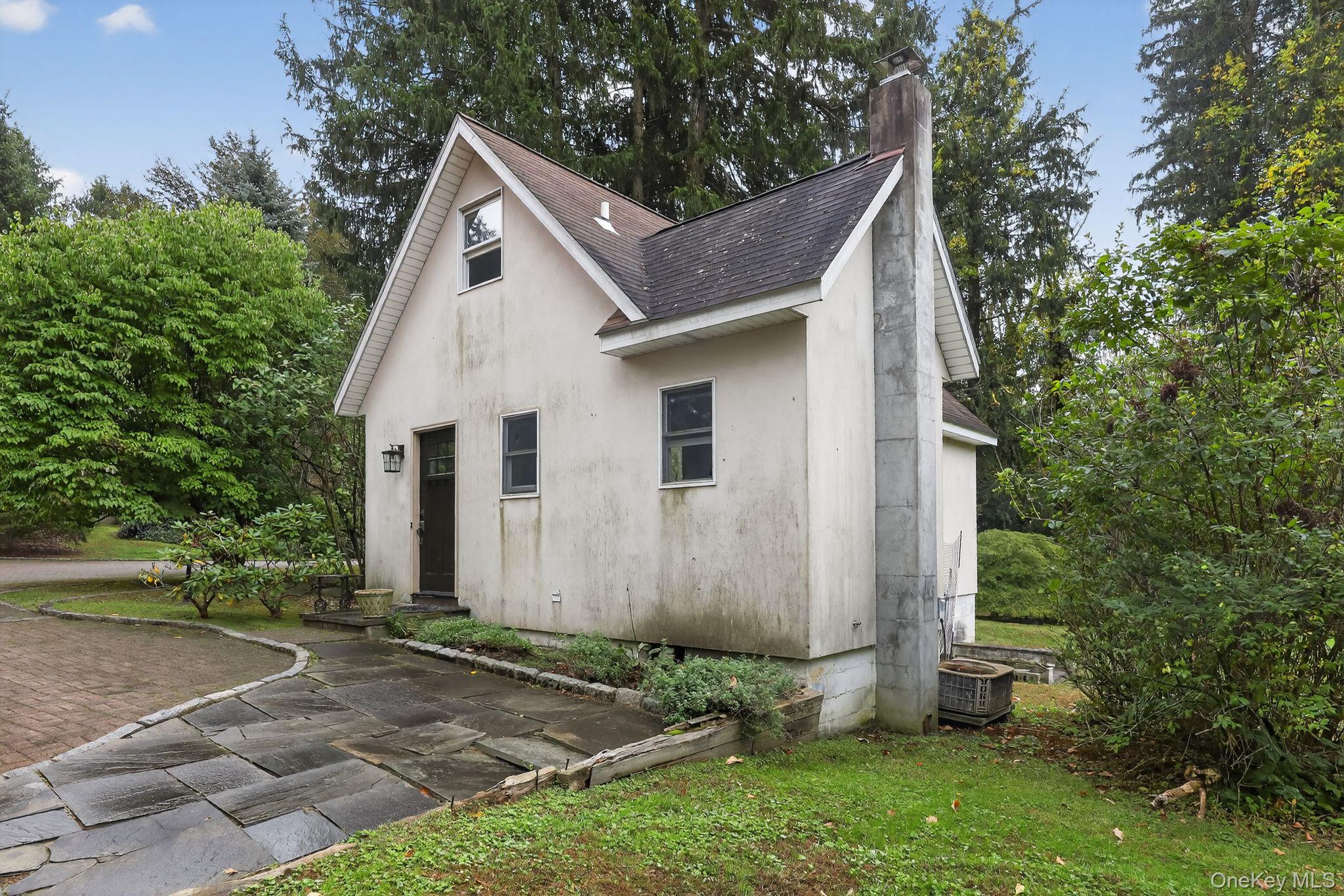 20 Old Mt Kisco Road Armonk, NY 10504 - Photo 8 of 50 a view of a house with a yard and large tree