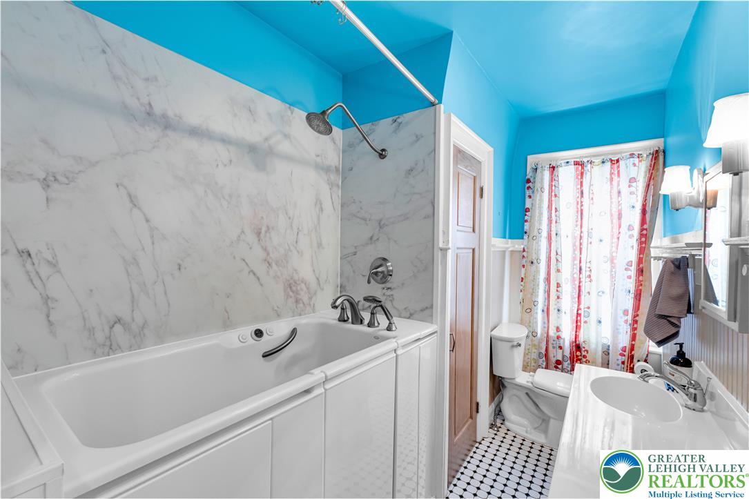 1722 Maple Street Bethlehem, PA 18017 - Photo 17 of 30 a bathroom with a sink a toilet and a bathtub